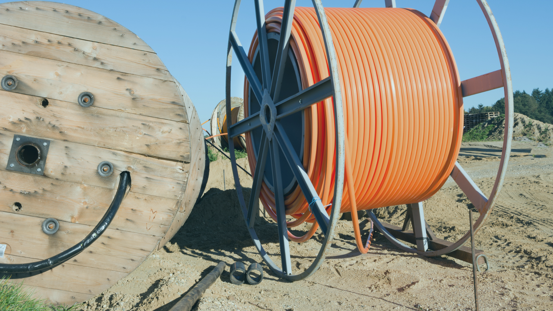 Fiber optic cable being laid in the ground